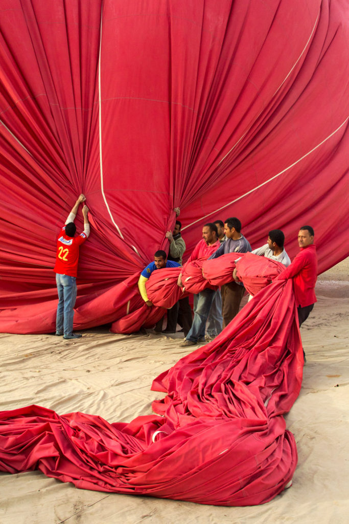 Deflating a Hot air Balloon at Valley of the Kings, Egypt