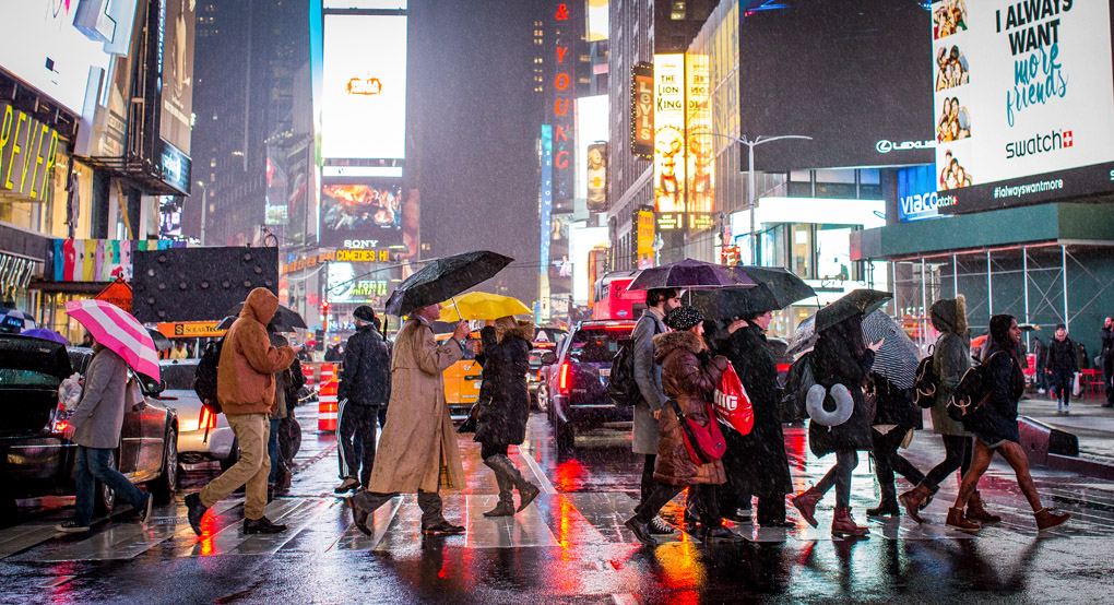 street photography, rain, umbrella, Time Square, night, crossing street, Mercedes Noriega, Mercedes Noriega Photography