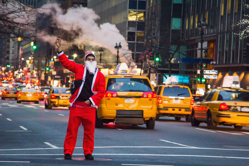 street photography, Santa Claus, christmas, rude santa, Mercedes Noriega, Mercedes Noriega Photography, taxi, taxis, yellow, cab, traffic, red, costume, winter, smoke